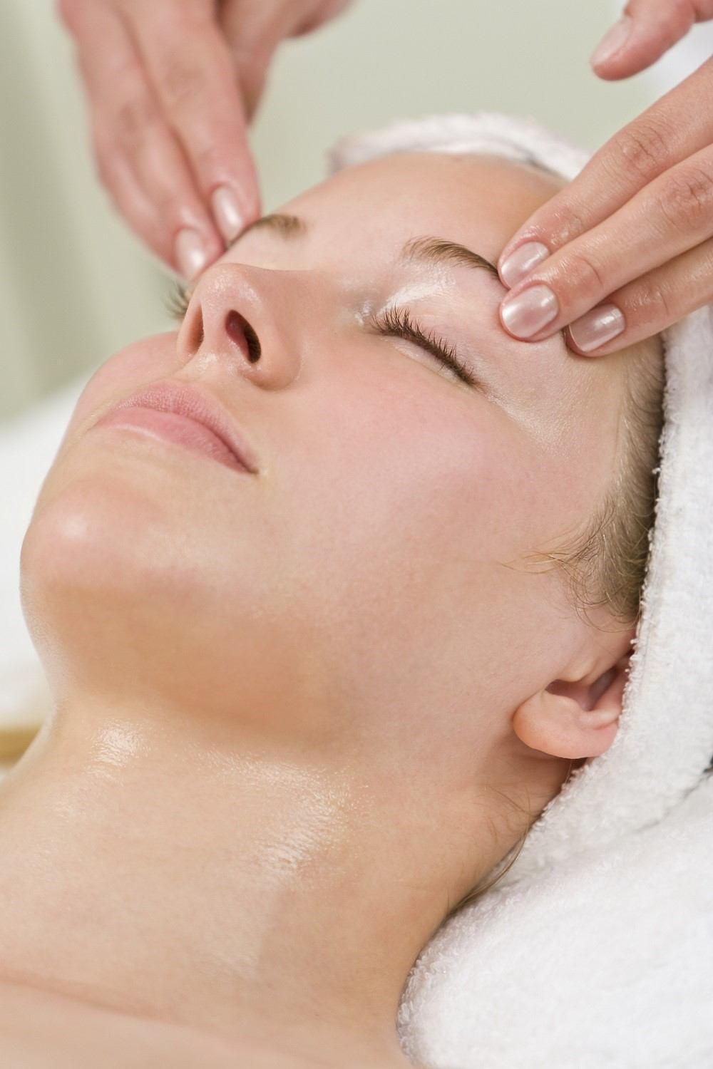 Photo of woman having a facial treatment