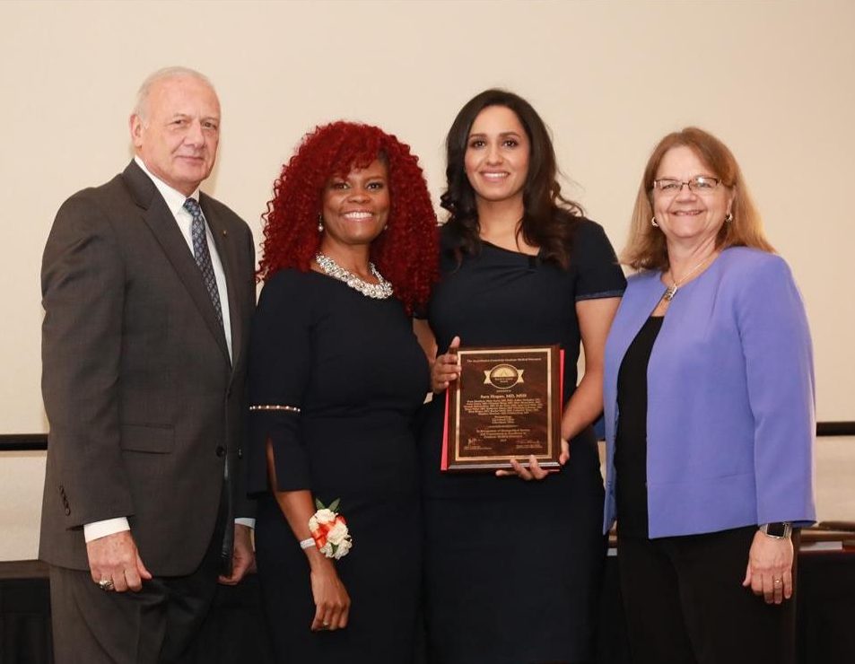 Sara Hogan with ACGME’s President, Awards Coordinator and Award Committee Chair