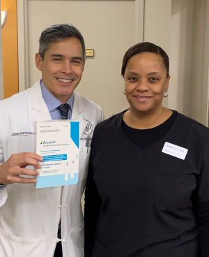 Dr. Sobell and his medical assistant with the newly arrived Bimzelx treatment for psoriasis