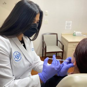 Dr. Mitalee Christman injecting Botox