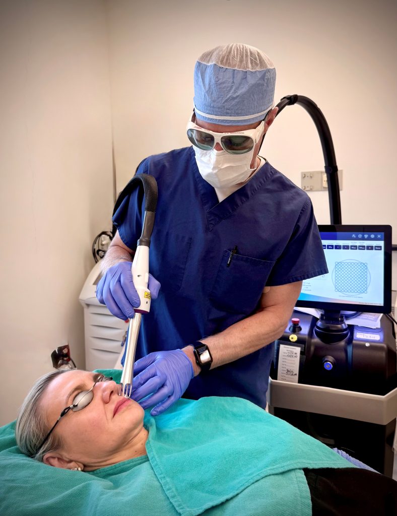 Dr. Rohrer treating a woman with UltraClear