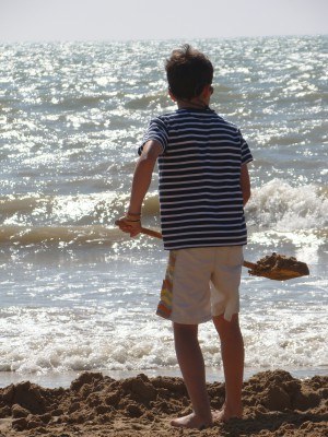 Child playing in the sun
